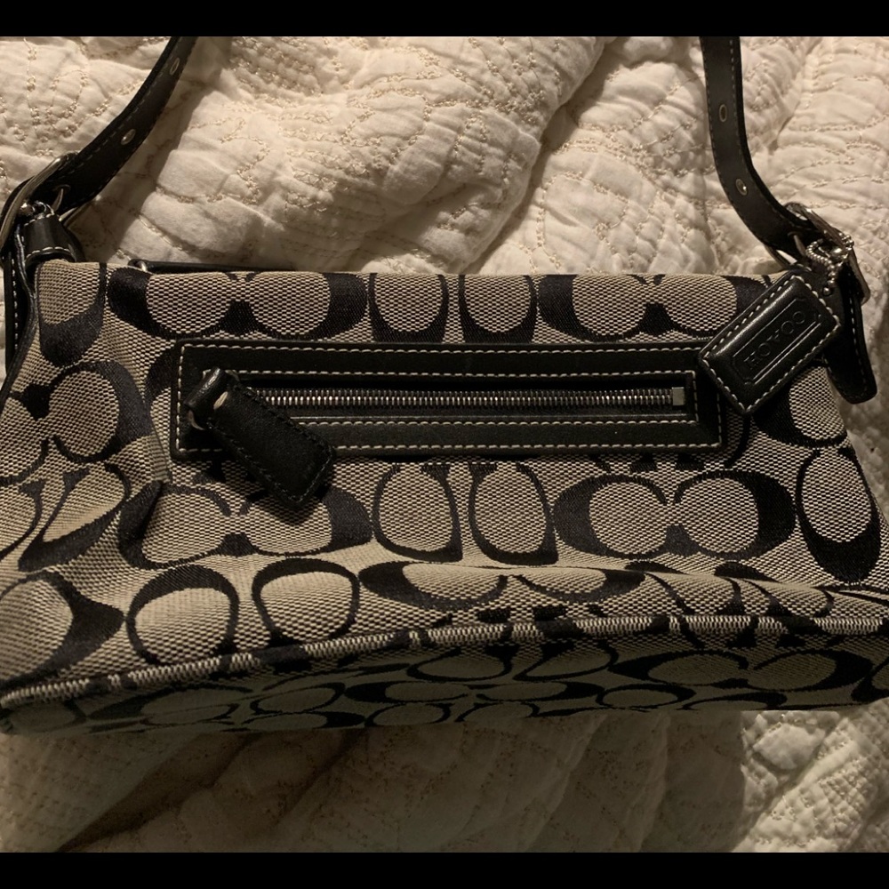 Coach Handbag Signature Print.